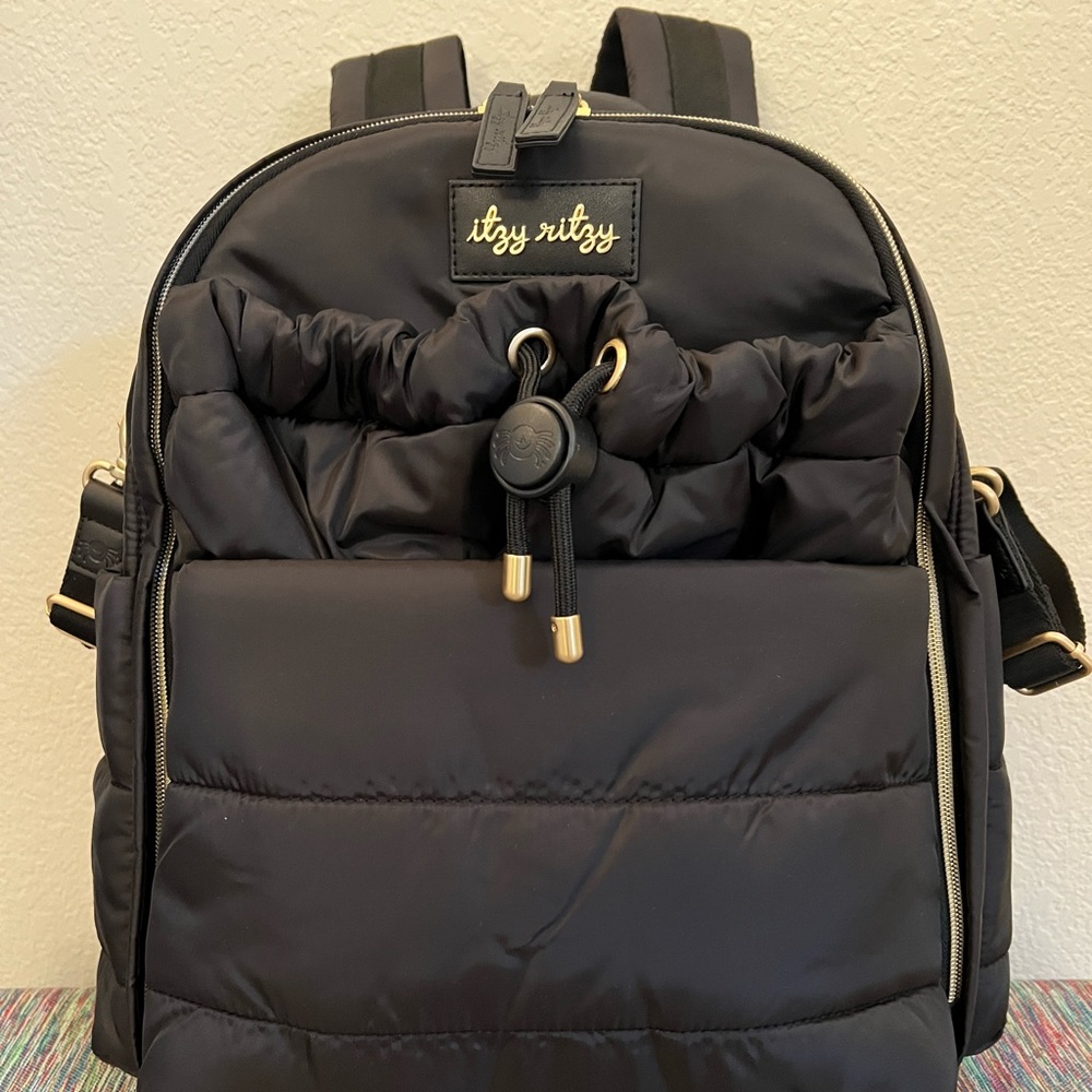 Brand new with tags Itzy Ritzy back pack